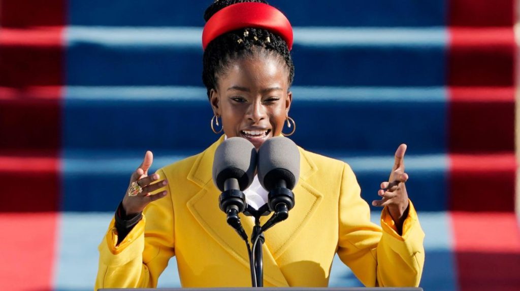 young African American woman wearing yellow blazer and stylish red hat