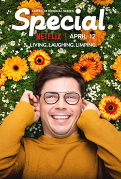 picture of laughing man wearing black glasses and orange sweater surrounded by flowers